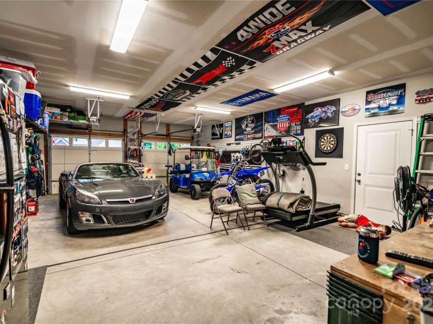 159 Holly Ridge Drive, Mooresville, NC 28115.  MLS# CAR4266521, YatesRealty ID 24623. Fit 4 cars in tandem!