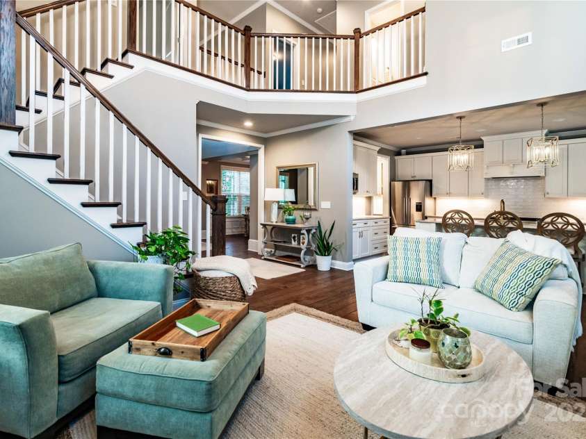 159 Holly Ridge Drive, Mooresville, NC 28115.  MLS# CAR4266521, YatesRealty ID 24623. Great room flows into chef's kitchen