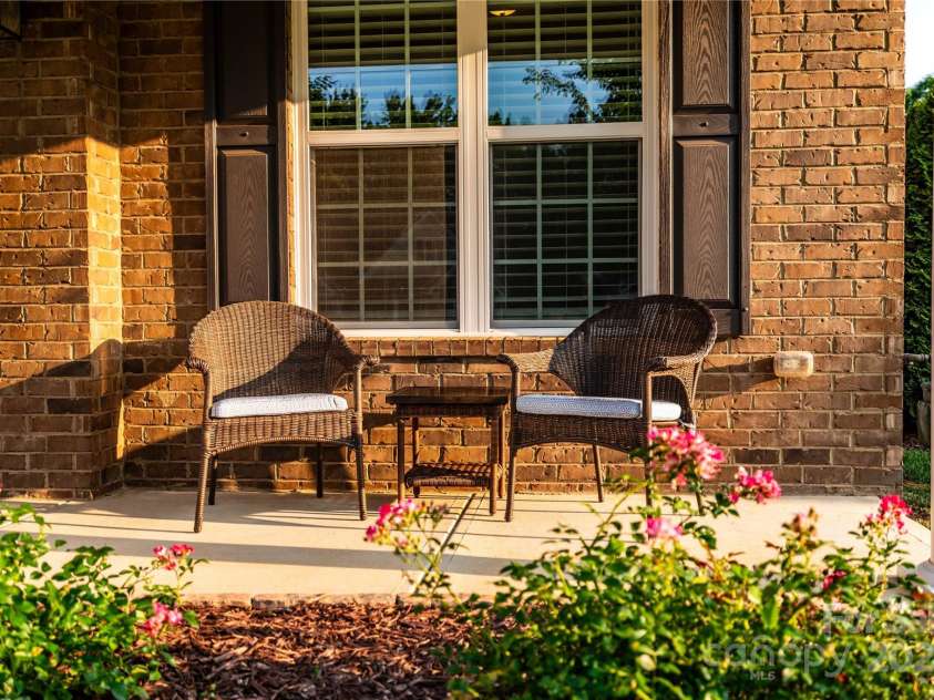 159 Holly Ridge Drive, Mooresville, NC 28115.  MLS# CAR4266521, YatesRealty ID 24623. Peaceful front porch