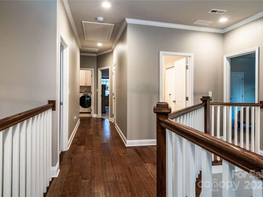 159 Holly Ridge Drive, Mooresville, NC 28115.  MLS# CAR4266521, YatesRealty ID 24623. Upstairs hall has wood floors