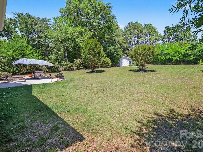 11539 Baystone Place, Concord, NC 28025.  MLS# CAR4382535, YatesRealty ID 24628. Spacious backyard 