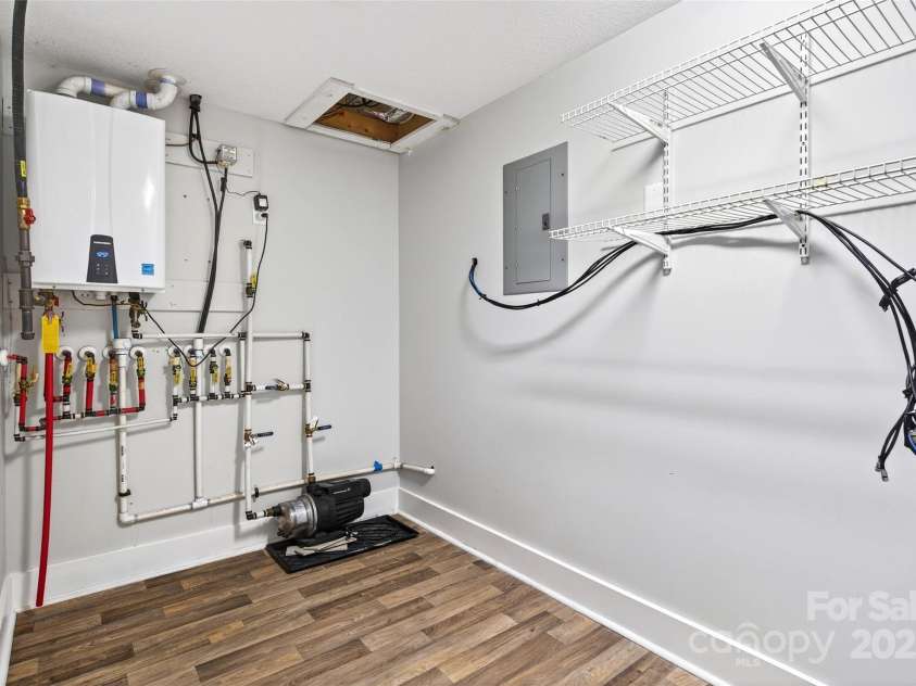 4 Stars Forever Drive, Black Mountain, NC 28711.  MLS# CAR4276305, YatesRealty ID 24633. Utility Closet