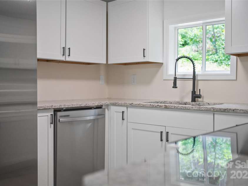 94 Camp Branch Road, Black Mountain, NC 28711.  MLS# CAR4261322, YatesRealty ID 24634. 