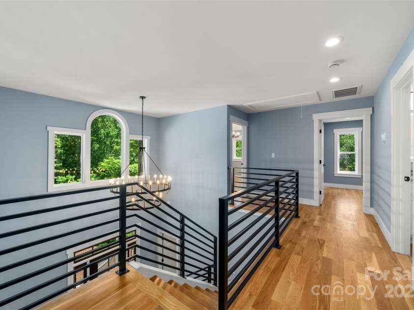 68 Bamboo Trail, Candler, NC 28715.  MLS# CAR4257307, YatesRealty ID 24635. Custom railings