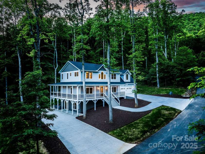 68 Bamboo Trail, Candler, NC 28715.  MLS# CAR4257307, YatesRealty ID 24635. Driveway on the left brings you to the lower level apartment door with no stairs.