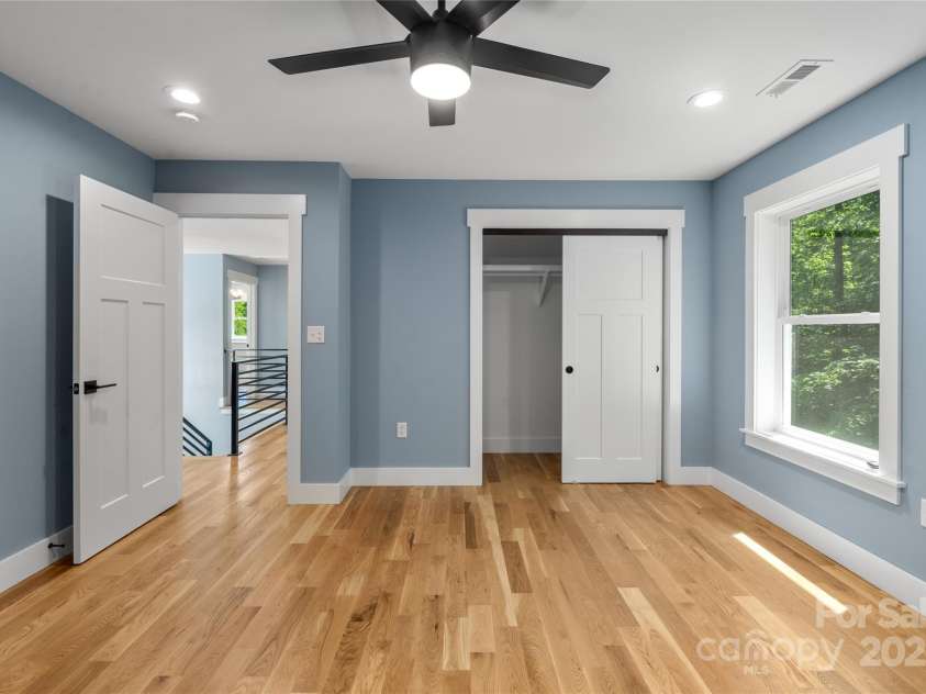 68 Bamboo Trail, Candler, NC 28715.  MLS# CAR4257307, YatesRealty ID 24635. Spacious upper level bedroom