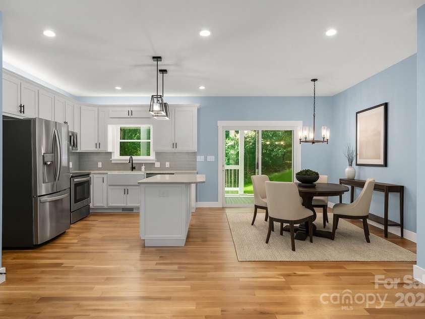 68 Bamboo Trail, Candler, NC 28715.  MLS# CAR4257307, YatesRealty ID 24635. Virtually staged dining area