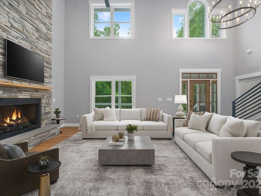 68 Bamboo Trail, Candler, NC 28715.  MLS# CAR4257307, YatesRealty ID 24635. Virtually staged great room