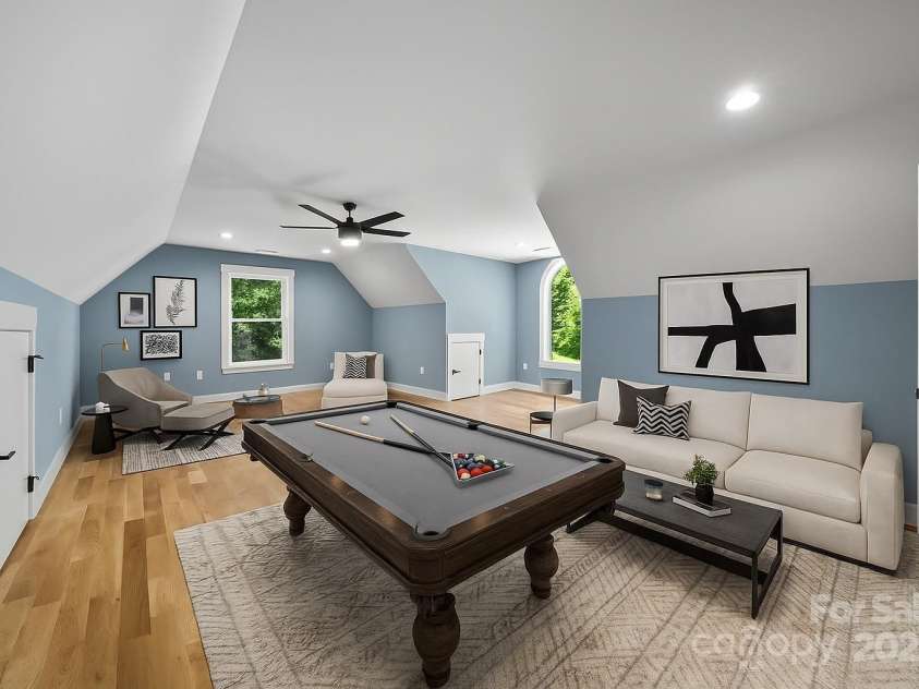 68 Bamboo Trail, Candler, NC 28715.  MLS# CAR4257307, YatesRealty ID 24635. Virtually staged upper level recreation room