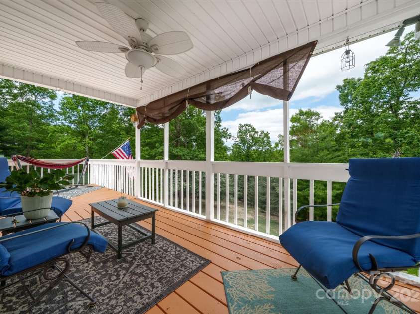186 Hawks Point Drive, Zirconia, NC 28790.  MLS# CAR4302595, YatesRealty ID 24638. Covered deck
