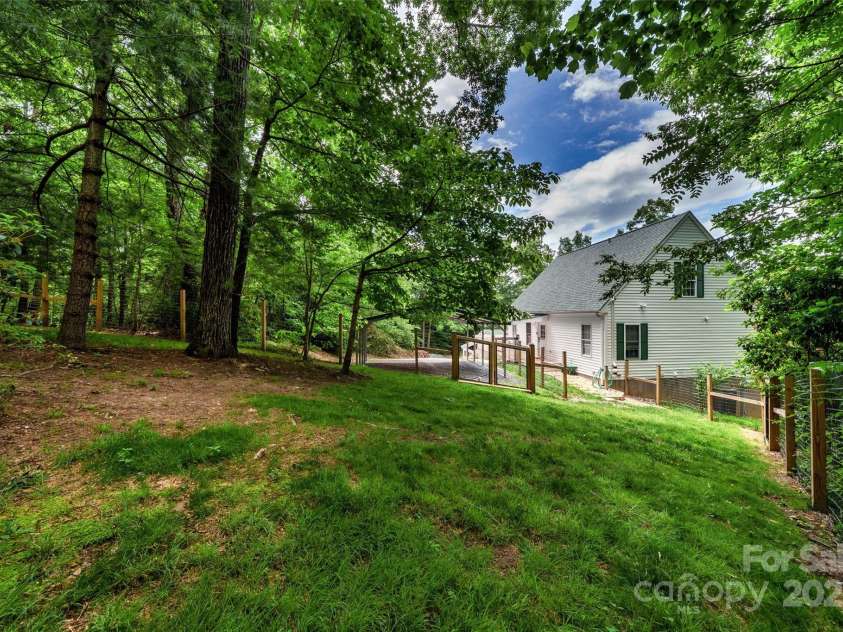 186 Hawks Point Drive, Zirconia, NC 28790.  MLS# CAR4302595, YatesRealty ID 24638. Fenced yard area