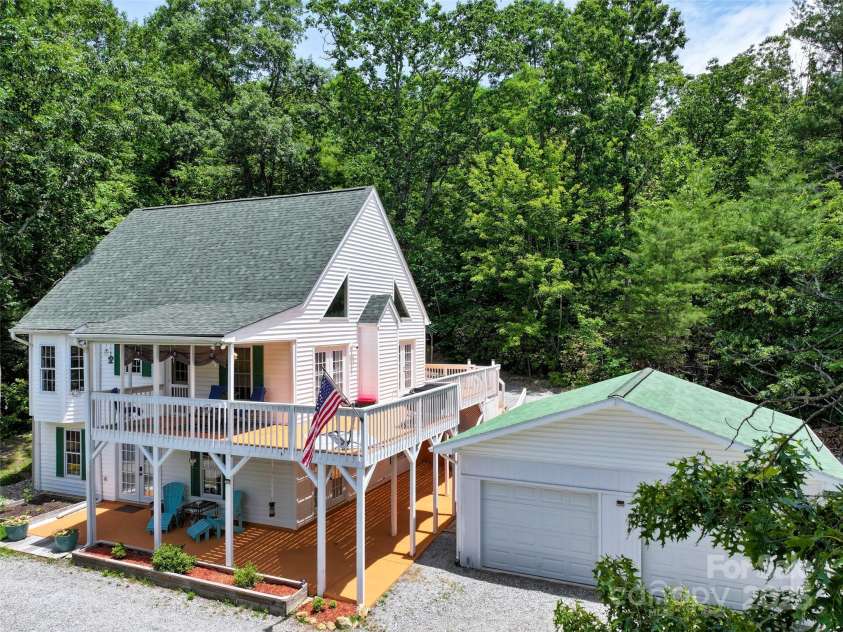 186 Hawks Point Drive, Zirconia, NC 28790.  MLS# CAR4302595, YatesRealty ID 24638. House & Garage