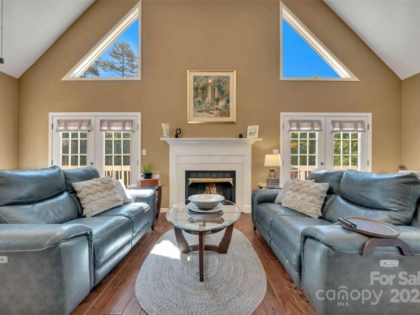186 Hawks Point Drive, Zirconia, NC 28790.  MLS# CAR4302595, YatesRealty ID 24638. Living Room & Fireplace