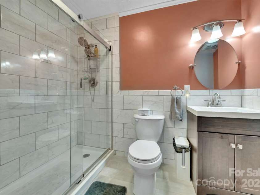 186 Hawks Point Drive, Zirconia, NC 28790.  MLS# CAR4302595, YatesRealty ID 24638. Lower Level Bathroom