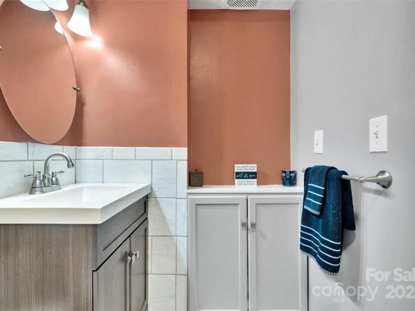 186 Hawks Point Drive, Zirconia, NC 28790.  MLS# CAR4302595, YatesRealty ID 24638. Lower Level bathroom