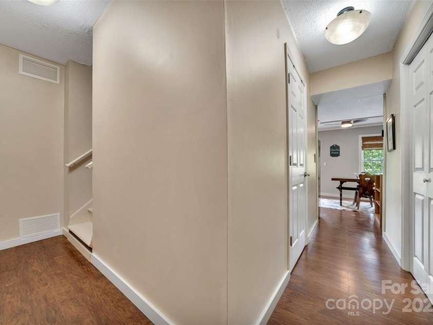 186 Hawks Point Drive, Zirconia, NC 28790.  MLS# CAR4302595, YatesRealty ID 24638. Lower level hallway