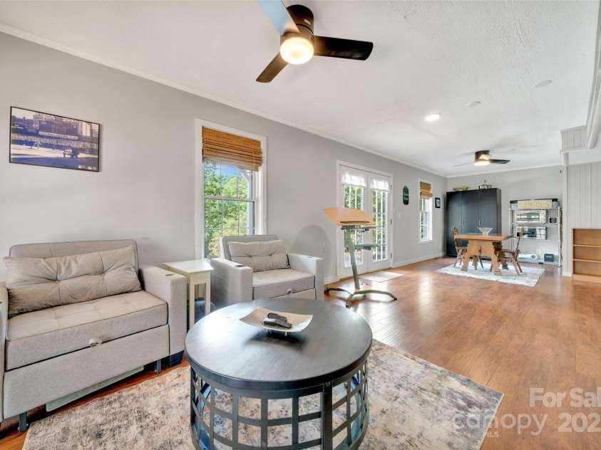 186 Hawks Point Drive, Zirconia, NC 28790.  MLS# CAR4302595, YatesRealty ID 24638. Lower level living area
