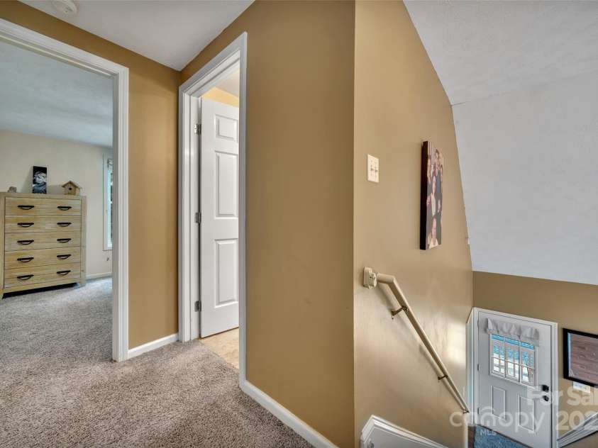 186 Hawks Point Drive, Zirconia, NC 28790.  MLS# CAR4302595, YatesRealty ID 24638. Upper level landing