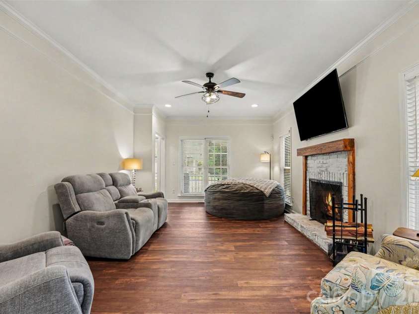 2272 Crosstrail Ridge, Rock Hill, SC 29732.  MLS# CAR4385538, YatesRealty ID 24641. Large den with wood burning fireplace, pretty mantle, lots of natural light