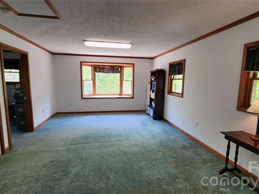120 Fox Run Ridge Drive, Blowing Rock, NC 28605.  MLS# CAR4383428, YatesRealty ID 24644. Upstairs den has bay window