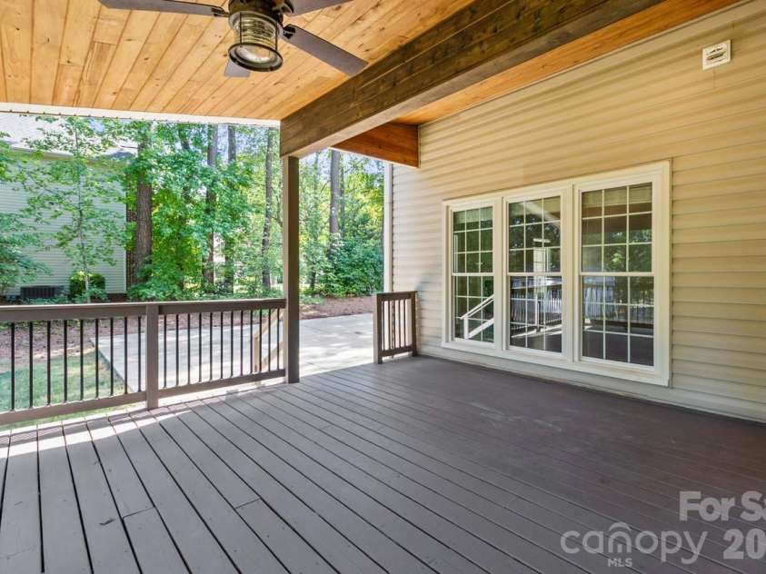 107 Jib Lane, Mooresville, NC 28117.  MLS# CAR4382872, YatesRealty ID 24646. Covered Back deck