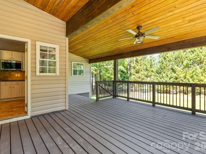 107 Jib Lane, Mooresville, NC 28117.  MLS# CAR4382872, YatesRealty ID 24646. Covered Back deck