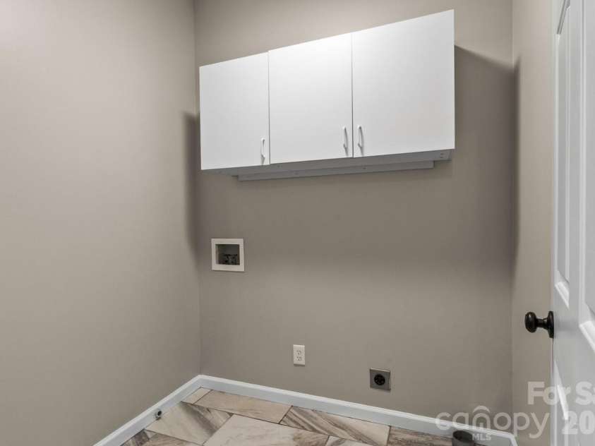 107 Jib Lane, Mooresville, NC 28117.  MLS# CAR4382872, YatesRealty ID 24646. Laundry room on upper level