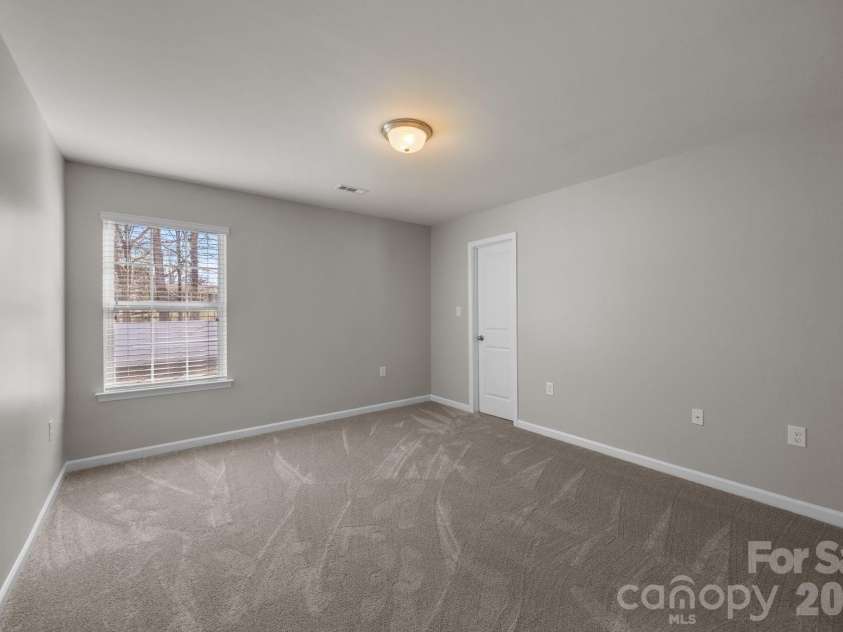116 Rippling Water Drive, Mount Holly, NC 28120.  MLS# CAR4338264, YatesRealty ID 24647. Bedroom 2.