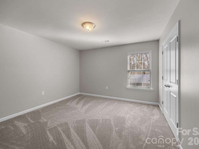 116 Rippling Water Drive, Mount Holly, NC 28120.  MLS# CAR4338264, YatesRealty ID 24647. Bedroom 3.