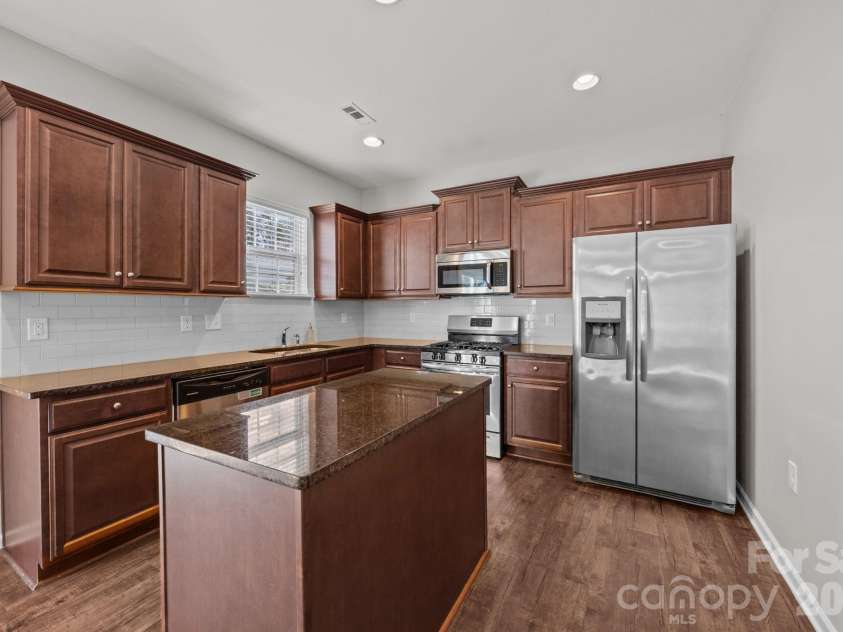 116 Rippling Water Drive, Mount Holly, NC 28120.  MLS# CAR4338264, YatesRealty ID 24647. Center island.