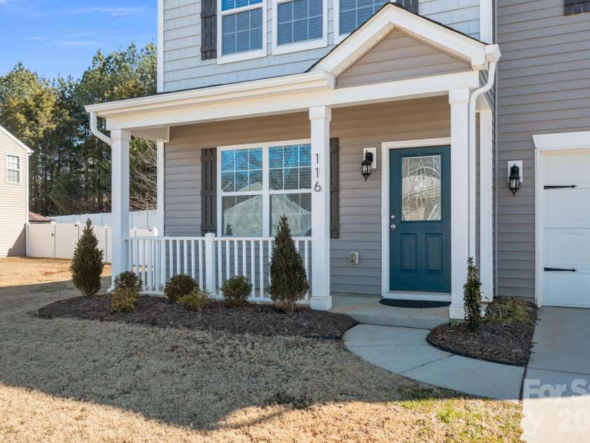116 Rippling Water Drive, Mount Holly, NC 28120.  MLS# CAR4338264, YatesRealty ID 24647. Front porch.
