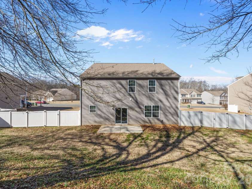 116 Rippling Water Drive, Mount Holly, NC 28120.  MLS# CAR4338264, YatesRealty ID 24647. Fully fenced backyard.