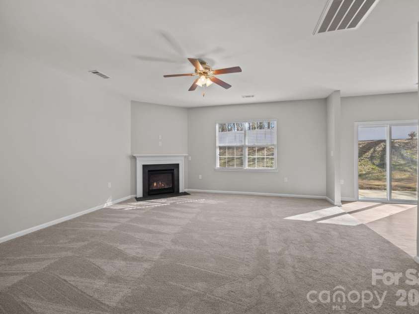 116 Rippling Water Drive, Mount Holly, NC 28120.  MLS# CAR4338264, YatesRealty ID 24647. Great room.