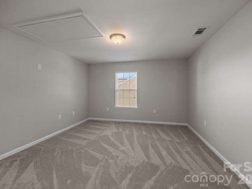 116 Rippling Water Drive, Mount Holly, NC 28120.  MLS# CAR4338264, YatesRealty ID 24647. Loft / bonus room.