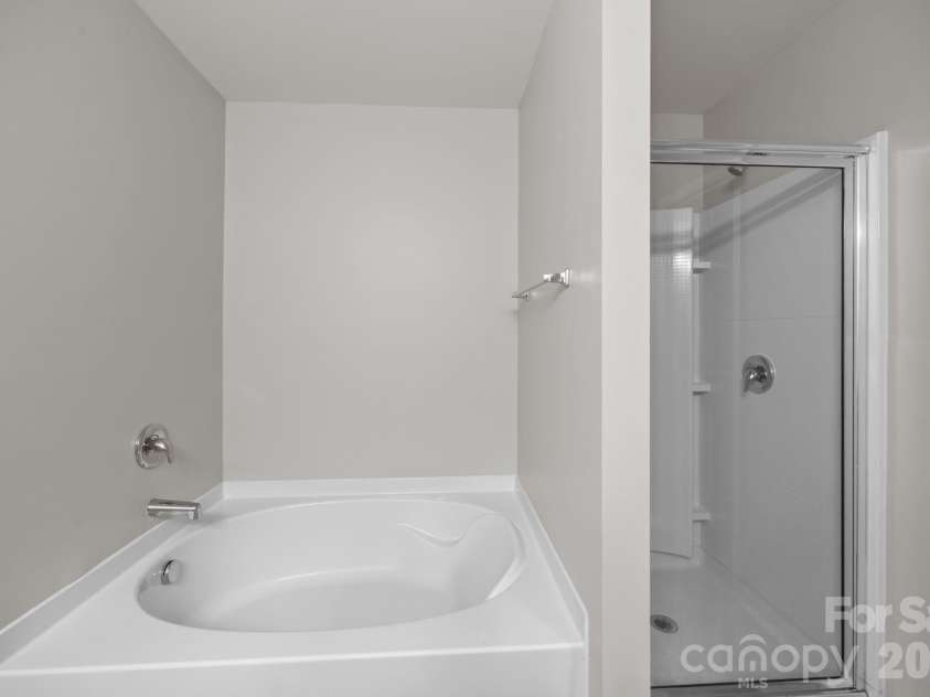 116 Rippling Water Drive, Mount Holly, NC 28120.  MLS# CAR4338264, YatesRealty ID 24647. Primary bathroom.