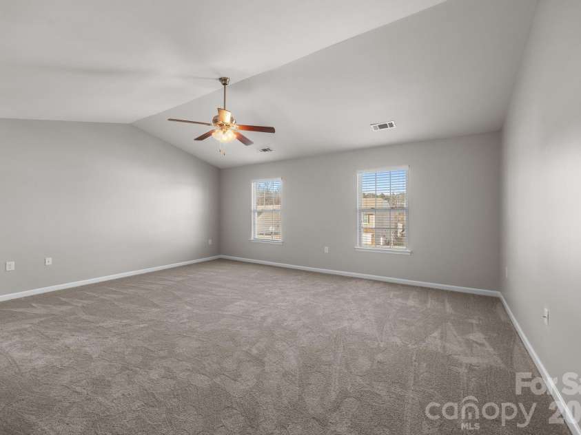 116 Rippling Water Drive, Mount Holly, NC 28120.  MLS# CAR4338264, YatesRealty ID 24647. Primary bedroom.