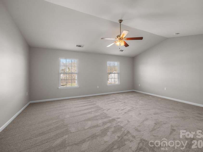 116 Rippling Water Drive, Mount Holly, NC 28120.  MLS# CAR4338264, YatesRealty ID 24647. Primary bedroom.