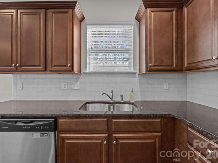 116 Rippling Water Drive, Mount Holly, NC 28120.  MLS# CAR4338264, YatesRealty ID 24647. Subway tile backsplash.