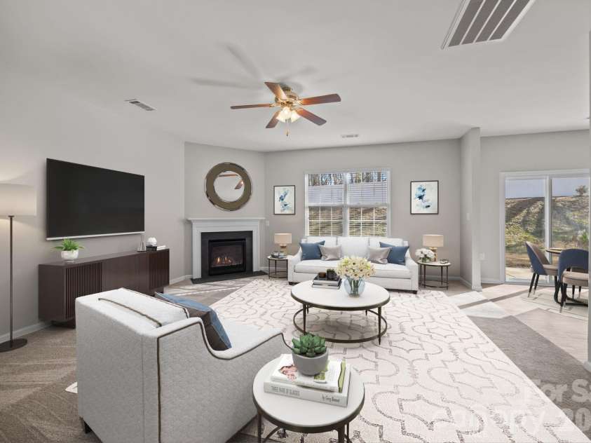 116 Rippling Water Drive, Mount Holly, NC 28120.  MLS# CAR4338264, YatesRealty ID 24647. Virtually staged great room.