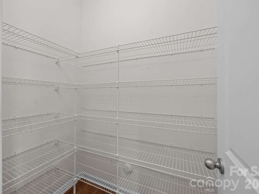 116 Rippling Water Drive, Mount Holly, NC 28120.  MLS# CAR4338264, YatesRealty ID 24647. Walk-in pantry.
