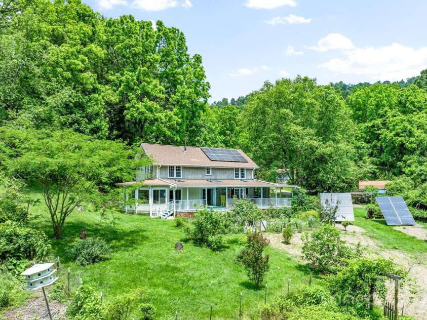 20 Pickens Lane, Weaverville, NC 28787.  MLS# CAR4267121, YatesRealty ID 24647. Back of house with solar panels