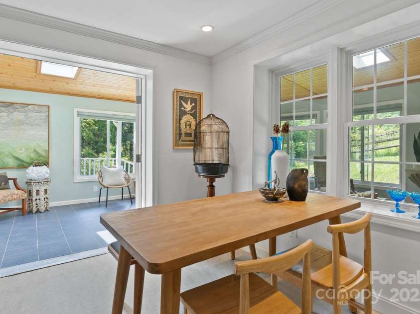 20 Pickens Lane, Weaverville, NC 28787.  MLS# CAR4267121, YatesRealty ID 24647. Dining area facing sun room