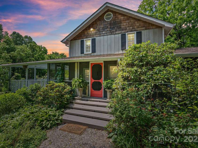 20 Pickens Lane, Weaverville, NC 28787.  MLS# CAR4267121, YatesRealty ID 24647. Dusk shot of front of house