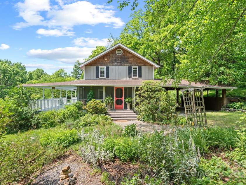 20 Pickens Lane, Weaverville, NC 28787.  MLS# CAR4267121, YatesRealty ID 24647. Front of house from Mandala garden