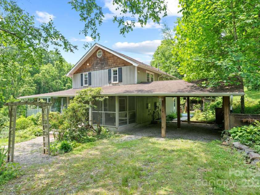 20 Pickens Lane, Weaverville, NC 28787.  MLS# CAR4267121, YatesRealty ID 24647. Front of house with carport