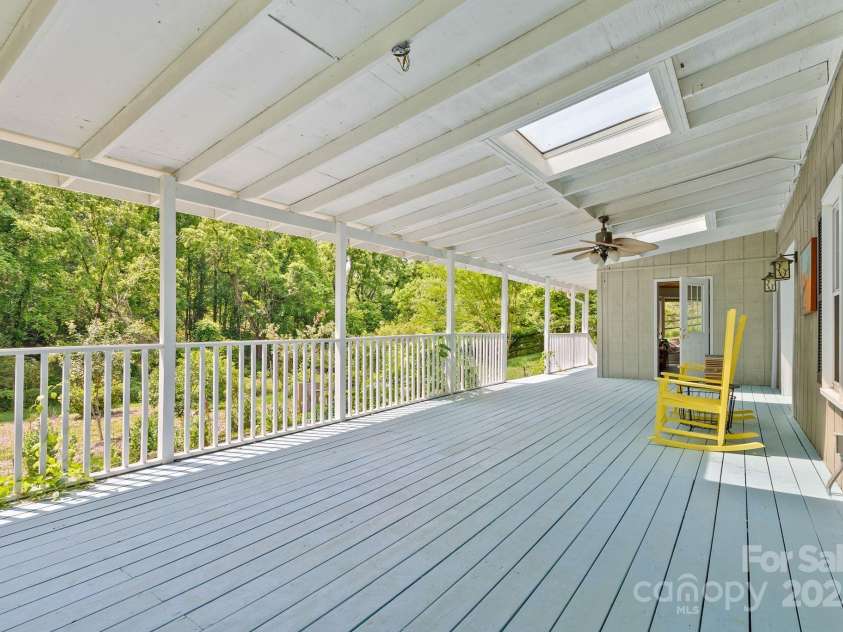20 Pickens Lane, Weaverville, NC 28787.  MLS# CAR4267121, YatesRealty ID 24647. Porch facing sun room