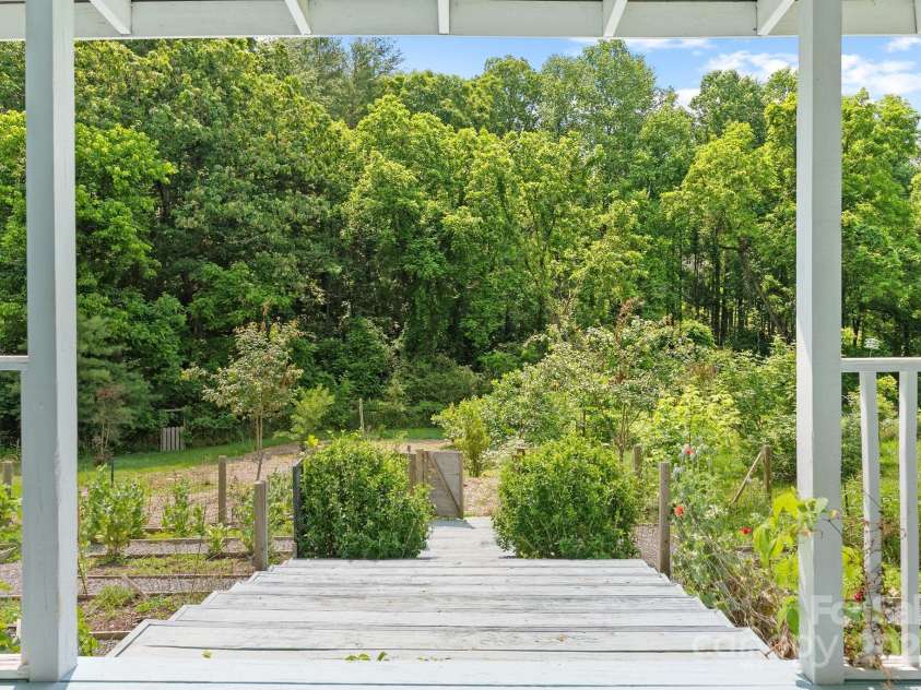 20 Pickens Lane, Weaverville, NC 28787.  MLS# CAR4267121, YatesRealty ID 24647. Porch stairs to garden