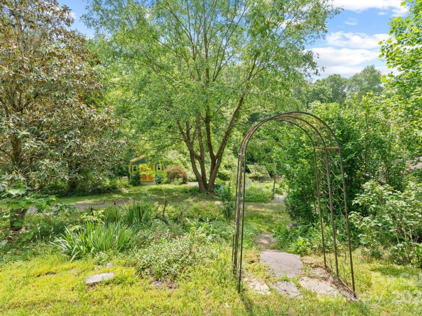 20 Pickens Lane, Weaverville, NC 28787.  MLS# CAR4267121, YatesRealty ID 24647. Upper garden facing artist studio