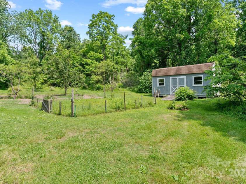 20 Pickens Lane, Weaverville, NC 28787.  MLS# CAR4267121, YatesRealty ID 24647. Upper garden with potters shed
