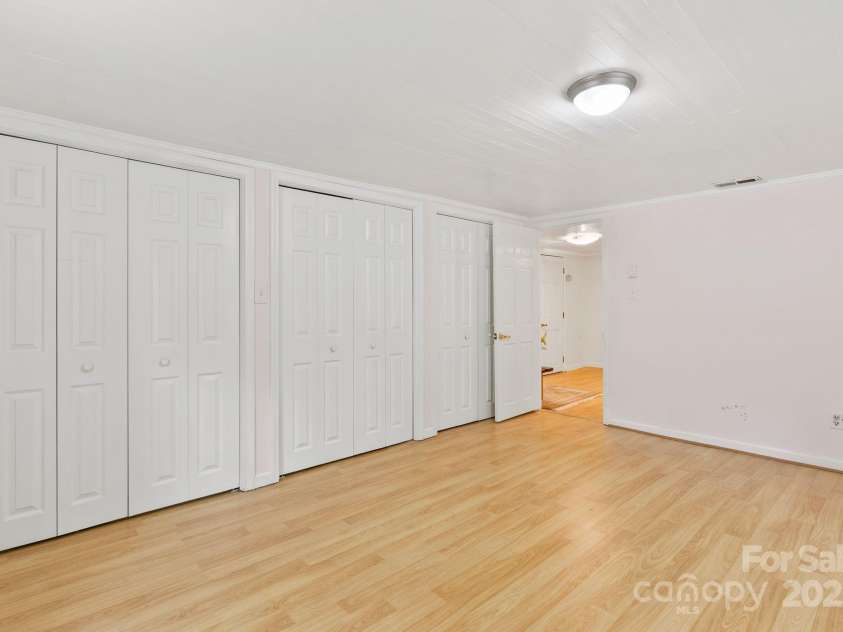 20 Pickens Lane, Weaverville, NC 28787.  MLS# CAR4267121, YatesRealty ID 24647. Upstairs bedroom north facing closet